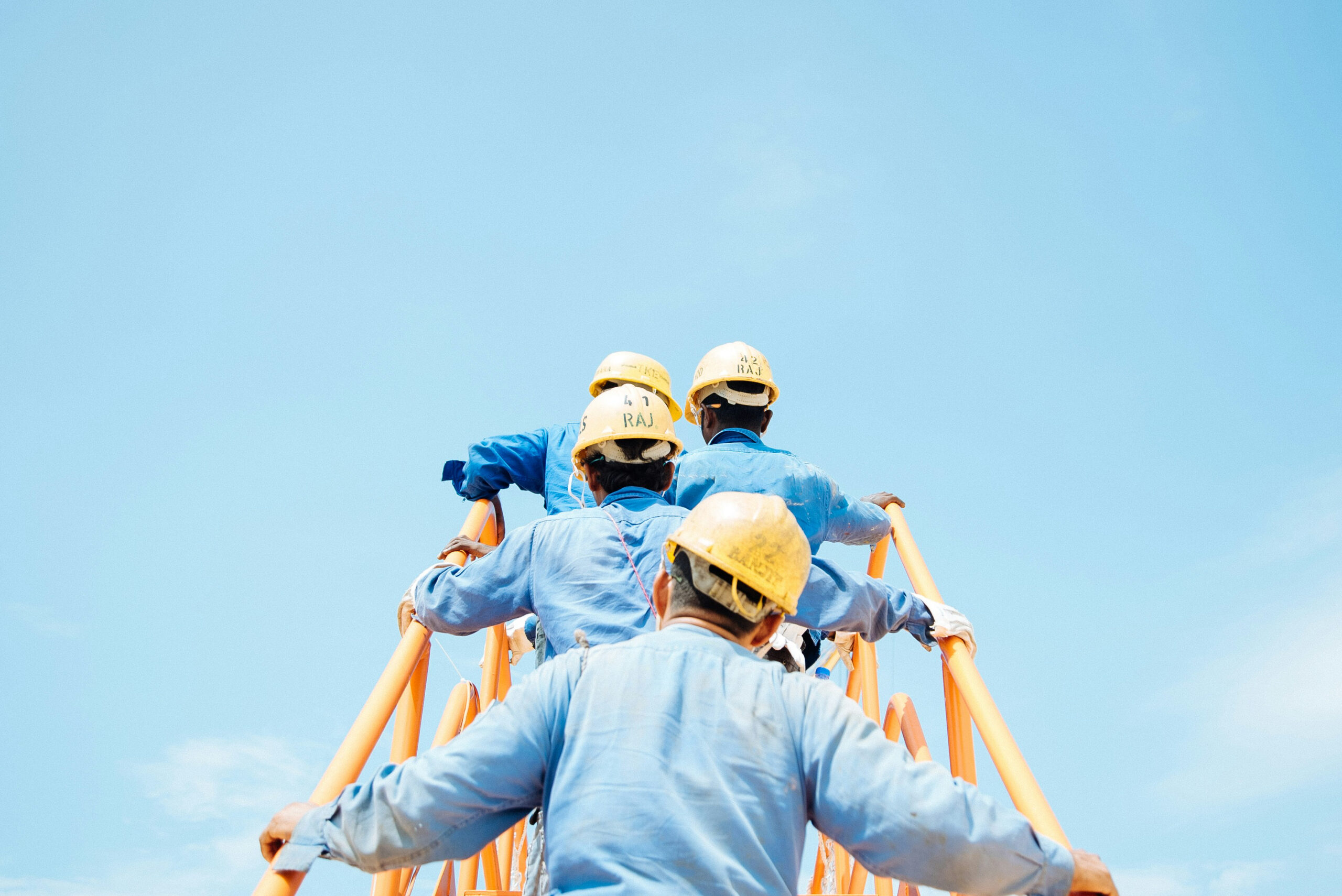 Ouvriers sur échelle